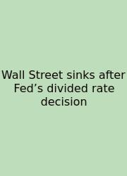 Wall Street Sinks After Fed’s Divided Rate Decision
